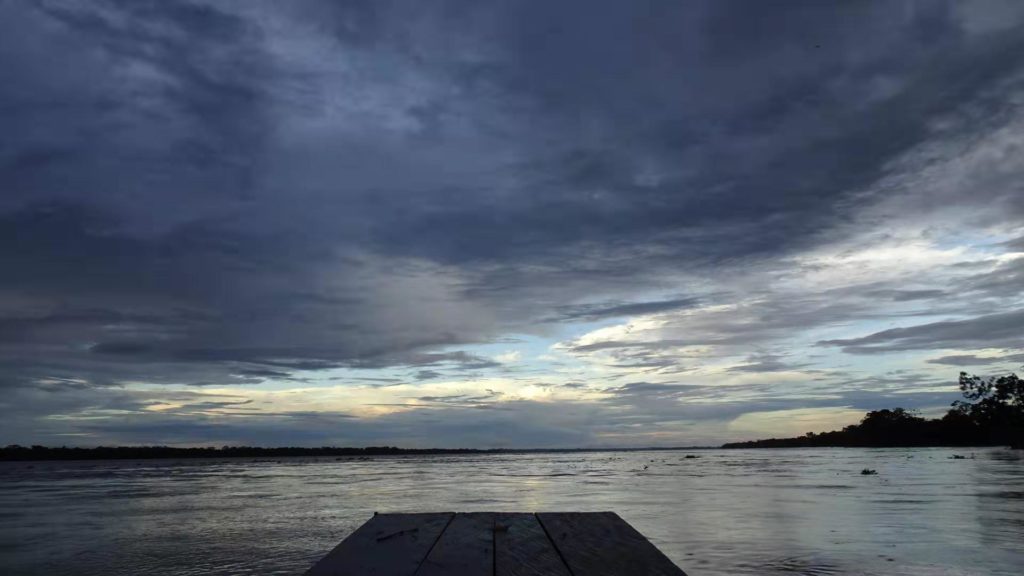 Peruvian sunset in Jungle from boat