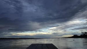 Peruvian sunset in Jungle from boat